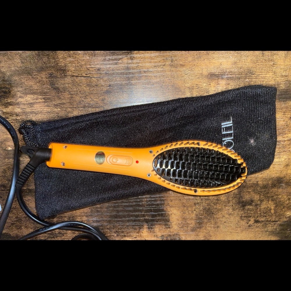 Brand new never used Soleil hairbrush straightener